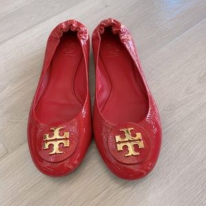 Tory Burch size 8 Patent Red with God Medallion